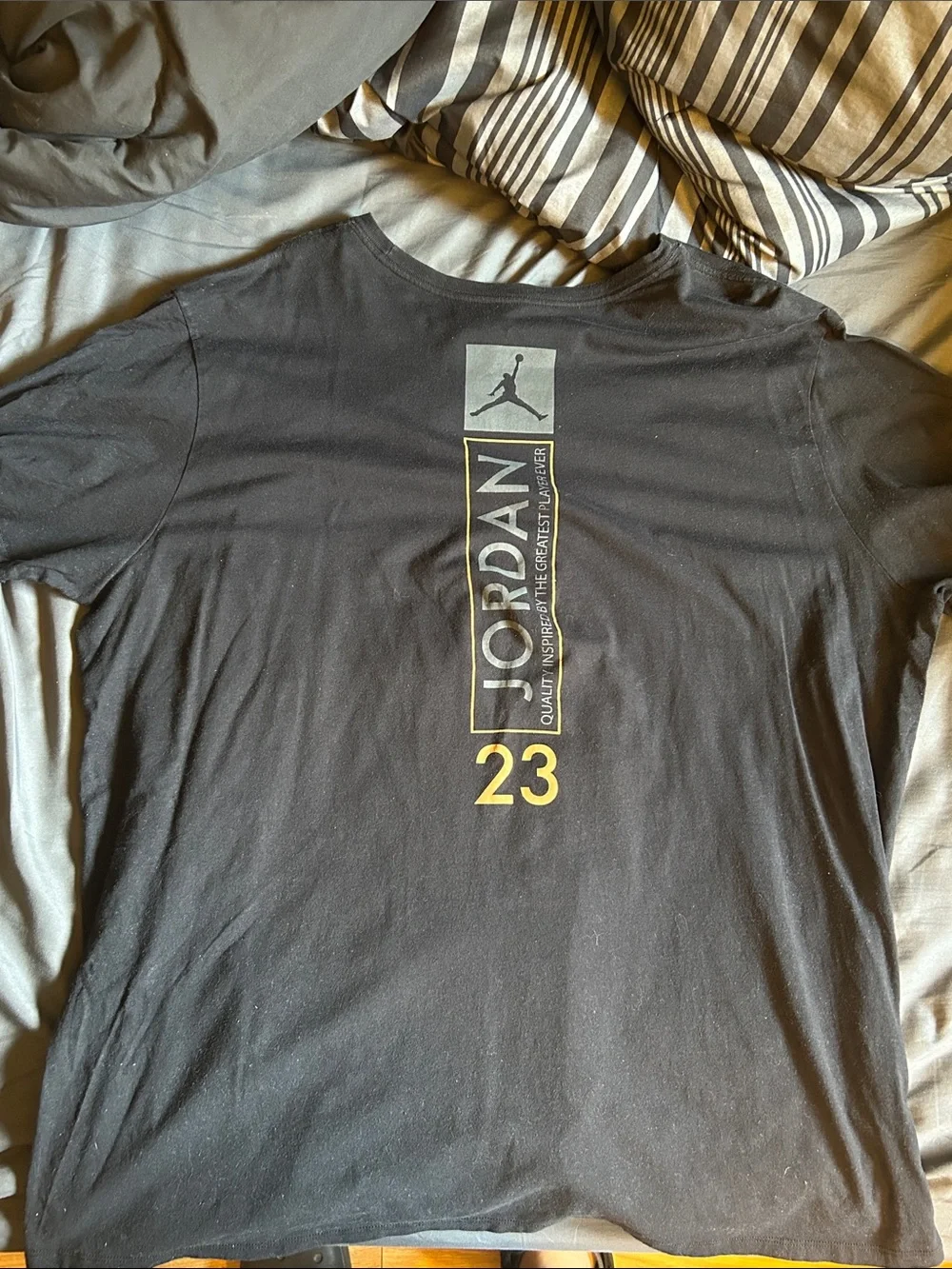 Jordan Men’s Black Short-Sleeve Tee with Yellow Vertical Graphic